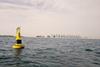 The buoys integrate a real time non-contact hydrocarbon sensor in the high visibility top frame design