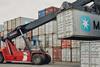 Kalmar forklift lifting a Maersk container
