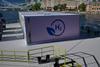 The image shows a render of a hydrogen-powered floating micro-grid