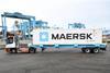 The image shows one of the electric automated terminal trucks (ATTs),
