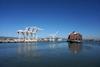 Oakland International Container Terminal charges a per container fee in its busiest times