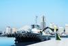 The picture shows an image of the Tokyo Kisen Co. Ltd and Marindows Inc. tug on the quayside