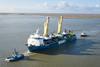 Tugs arriving at the Port of Antwerp-Bruges on board the Jumbo Kinetic heavy-duty vessel