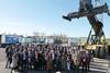 People standing on the quay at the Port of Valencia celebrating the finale of the H2Ports project