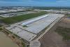 Aerial shot of a large warehouse at Cedar-Port Operations and Logistics Terminal