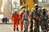 Workers at a port in safety gear