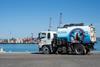 The image shows the port's new Sweeper Truck 'Sweeping Beauty' on the quayside