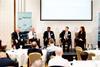 The image shows pannelists in discussion at the Maritime Power-to-X stakeholder event