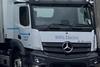 The image shows a close-up of an electric HGV which will be tested by DP World UK