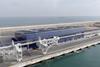 The image shows Barcelona's cruise Terminal H at Adossat Wharf