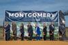 Eight people with spades, breaking ground at the Montgomery Intermodal Container Transfer Facility at the Port of Alabama