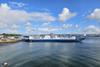 The image shows the Torpoint ferry on the water
