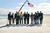 (l-r) Secretary of State Gregg Amore, R.I. Sen. Alana DiMario, U.S. Sen. Sheldon Whitehouse, R.I. Rep. Robert Craven, Matthew King, R.I. Gov. Dan McKee, QDC MD Steven J. King, U.S. Sen. Jack Reed, N.K. Councilwoman Beth Hill Ross, U.S. Rep. Gabe Amo, Comm