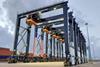 The image shows the Konecranes RTGs on the quayside at Houston