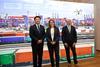 The image shows the MoU signing with Kei Nomura (Kawasaki Heavy Industries, Ltd.), Annette Walter (HHLA), Dr. Manfred Schuckert (Daimler Truck AG)