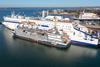 The image shows The Brittany Ferries’ electric-hybrid vessel, Saint-Malo, receiving LNG bunkering from Optimus