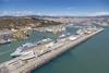 Aerial shot of the Port of Barcelona showing four cruise ships at dock