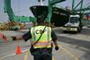 US_customs_officer_directing_a_truck.jpg