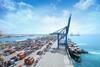 AI image of Jeddah South Container Terminal showing containers, a ship dockside and a crane