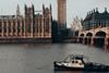 The image shows the River Thames with Big Ben and the Houses of Parliament in the background