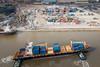 The image shows a view of the DP World terminal at Maputo