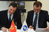 Mehmet Kutman, chairman of Global Investment Holdings (L) and Jean-Marc Peterschmitt, EBRD managing director for industry, commerce and agribusiness (R)