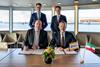 The image shows Markus Bangen - CEO duisport, Boudewijn Siemons - CEO Port of Rotterdam. Standing: Hendrik Wüst - minister president NRW, dr. Nikolaus Meyer-Landrut - German Ambassador to the Netherlands