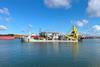 The image shows the vessel J.F.J. De Nul performing dredging and reclamation works in Port Hedland