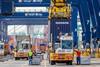 PORT-OF-LOS-ANGELES-LABOR-Dockworkers-move-cargo-on-a-container-terminal.-Photo-Port-of-Los-Angeles.