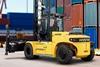 The Hyster J6-7XD-EC3/4 pictured in front of containers