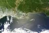 The oil spill creeps closer to the Mississippi Delta - but a loop current may take some of it to Florida. Photo: NASA