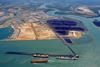 Dredging is a contentious issue at Gladstone Harbour (pictured) and Abbot Point because they are next to the Great Barrier Reef