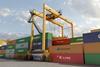 Image of an RTG crane and containers