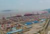 The image shows an aerial picture of the Port of Ningbo-Zhoushan