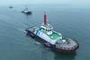 The image shows the Qing Dian Tuo 1 on the water