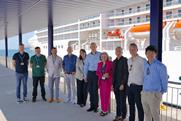 The image shows Ana Arévalo, head of the shorepower department at the Port of Barcelona, with several members of her team, the manager of the MSC terminal, Sandra Yunta, and Peter Castberg with the PowerCon team in charge of developing the project