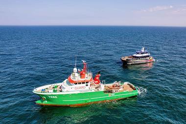 The image shows PD Ports' new Pilot boat and an E tug on the water