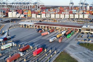 Containers, trucks and cranes at the Port of Savannah
