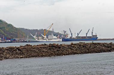 Puerto Caldera - two ships at port with a breakwater in the foreground