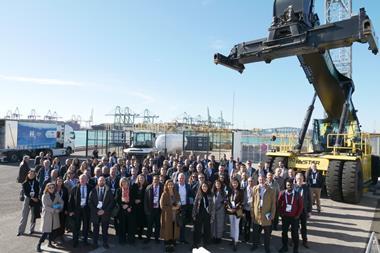 People standing on the quay at the Port of Valencia celebrating the finale of the H2Ports project