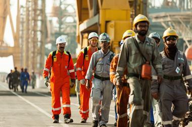 Workers at a port in safety gear