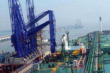 A wide angle short of a ship at berth at Mumbai Port