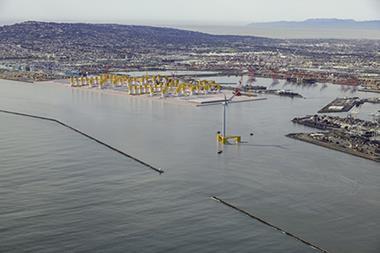 offshore wind turbine with port behind