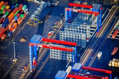 The images shows state-of-the-art port equipment in action at HHLA Container Terminal Burchardkai (CTB) in Hamburg