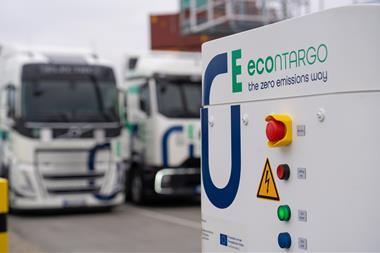 The image shows a Contargo e-truck charging facility