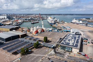 The image shows an overhead shot of ferries berthing at Portsmouth International Port