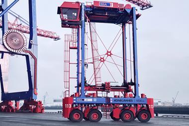 An image of the Konecranes hybrid straddle carrier on the quayside