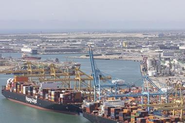aerial shot of the Port of Barcelona showing two containers ships