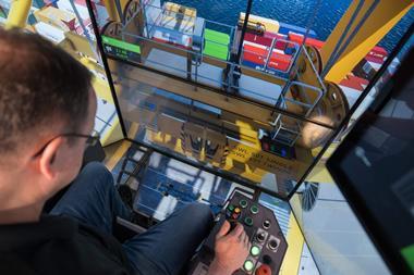 The image shows an operator undertaking CMLabs MasterCab STS crane simulator training