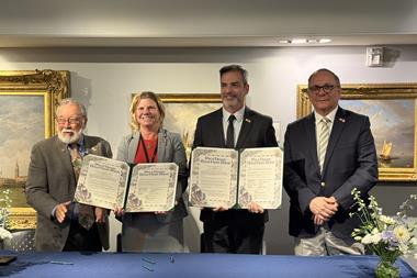 The ports’ CEOs and board members celebrate the MOU